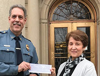 Haddonfield Police receiving a check